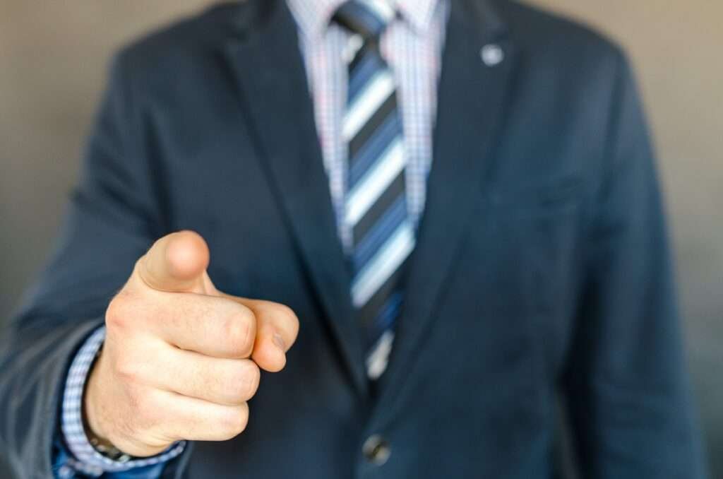 Photo by Lukas: https://www.pexels.com/photo/man-wearing-a-suit-jacket-and-stripe-necktie-652355/